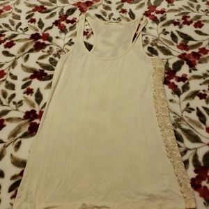 Cream color tank with lace side